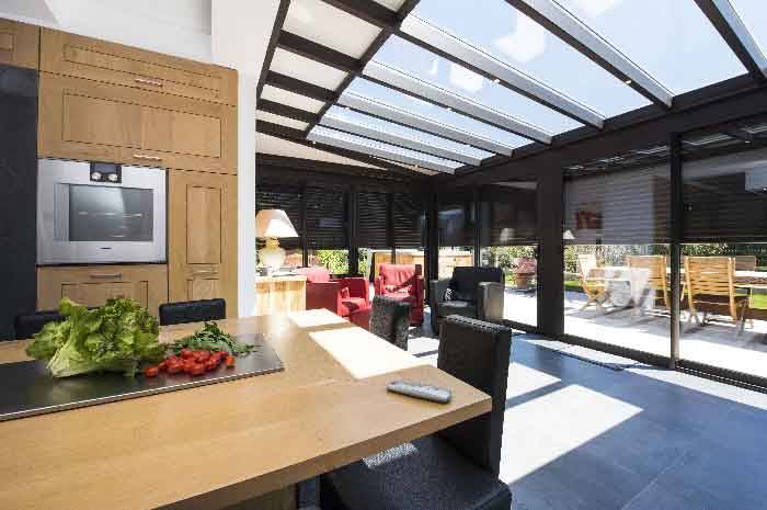 Veranda-cuisine-flex veranda-toit-vitre-cuisine-salon-stores