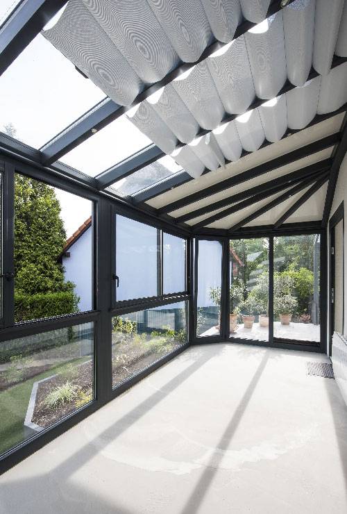Veranda-Ebert-portrait veranda-toit-vitre-stores-gris-anthracite