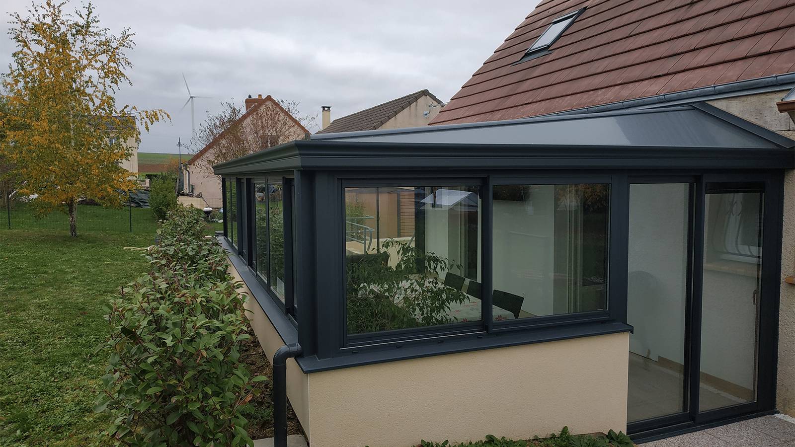 veranda-toiture-opaque-puit-de-lumiere Véranda toiture opaque extérieur
