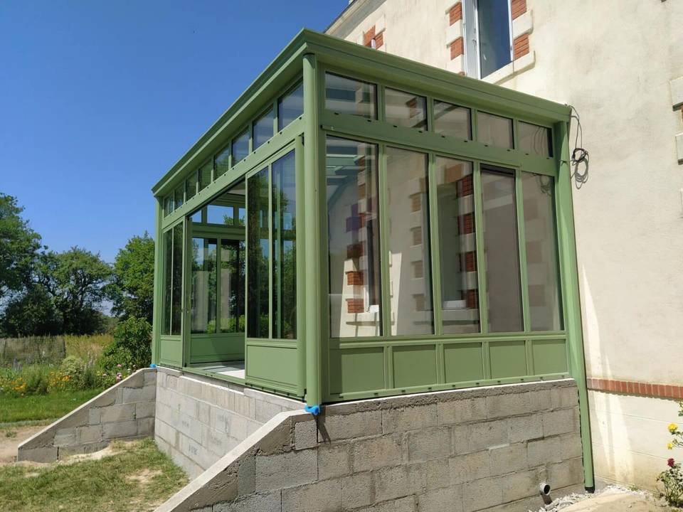 IMG_20230602_132212 Véranda en aluminium verte ajoutée à une maison de campagne