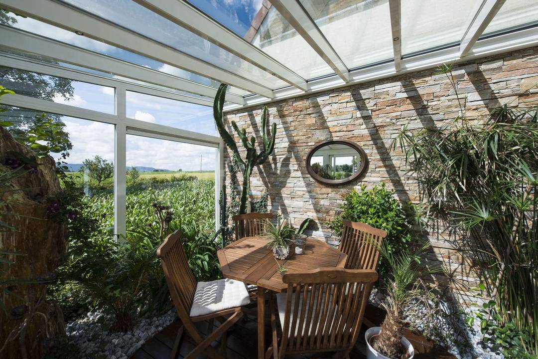 Véranda transformée en jardin d'hiver Véranda transformée en jardin d'hiver